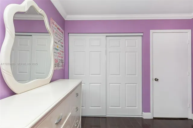 a room with a table and chairs