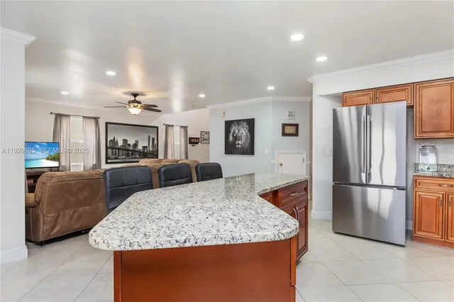 a kitchen that has cabinets and a sink