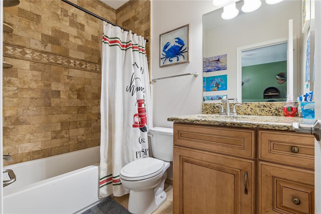 345 Cypress Isles Road Osteen, FL 32764 - Photo 19 of 41 a bathroom with a sink toilet and shower