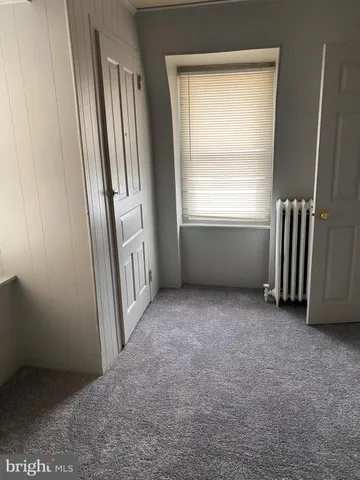 an empty room with closet