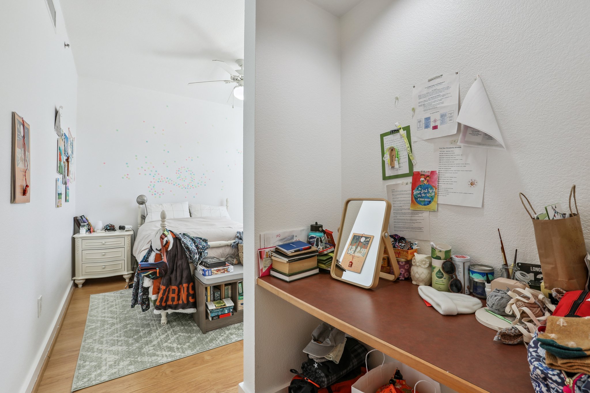 711 West 26th Street, Unit 704 Austin, TX 78705 - Photo 24 of 32 a view of a workspace with furniture and a bedroom