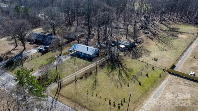 a view of a swimming pool with sitting area