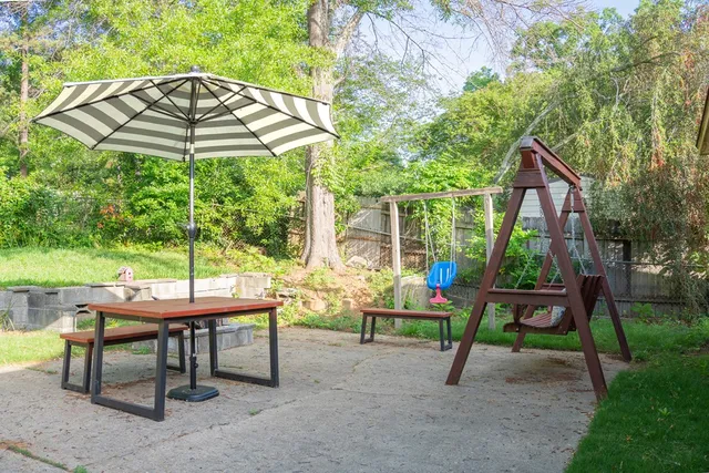 a backyard view of a sitting space