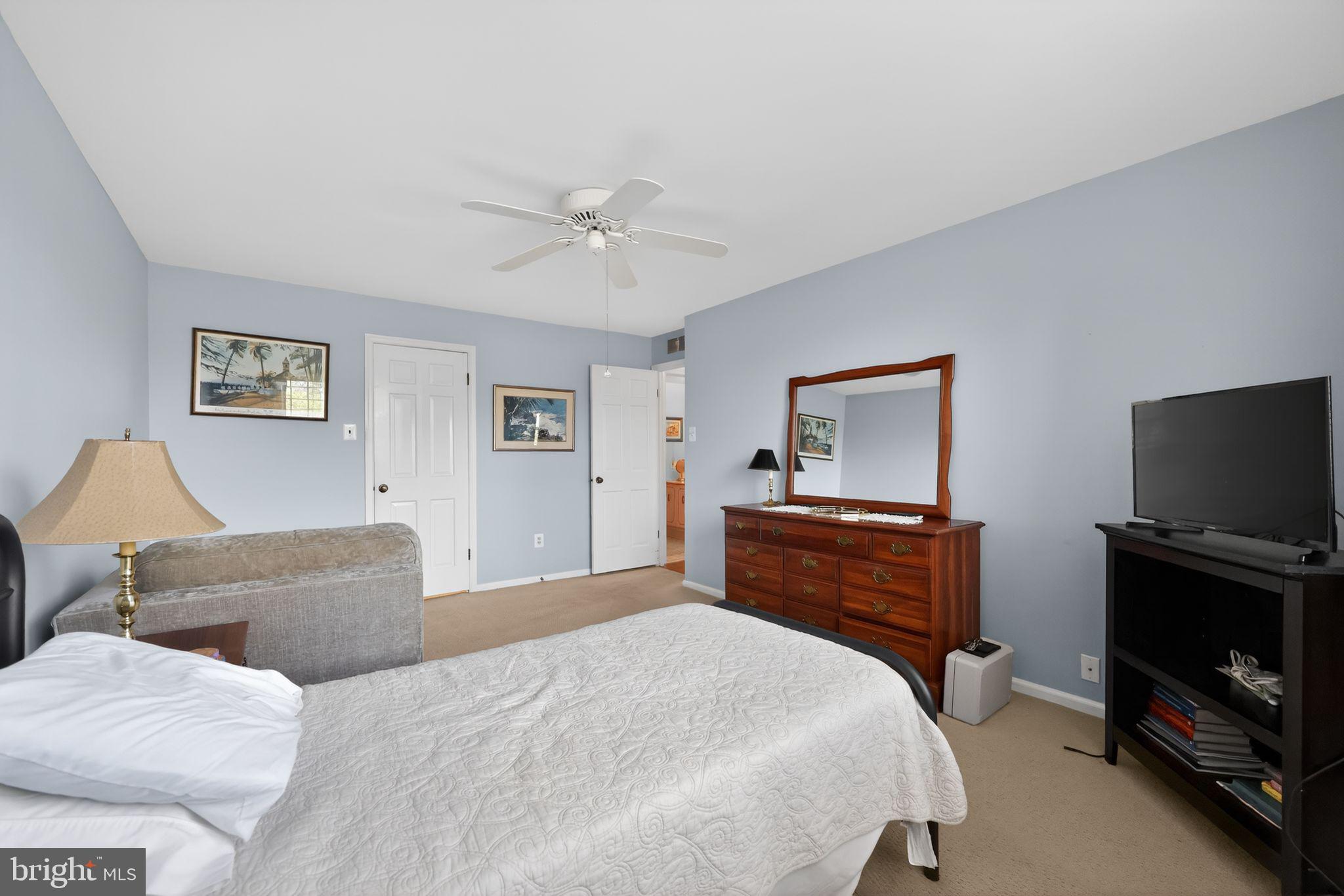 213 Haddonfield Cmns, Unit 213 Haddonfield, NJ 08033 - Photo 19 of 35 Serene bedroom with soft blue hues.
