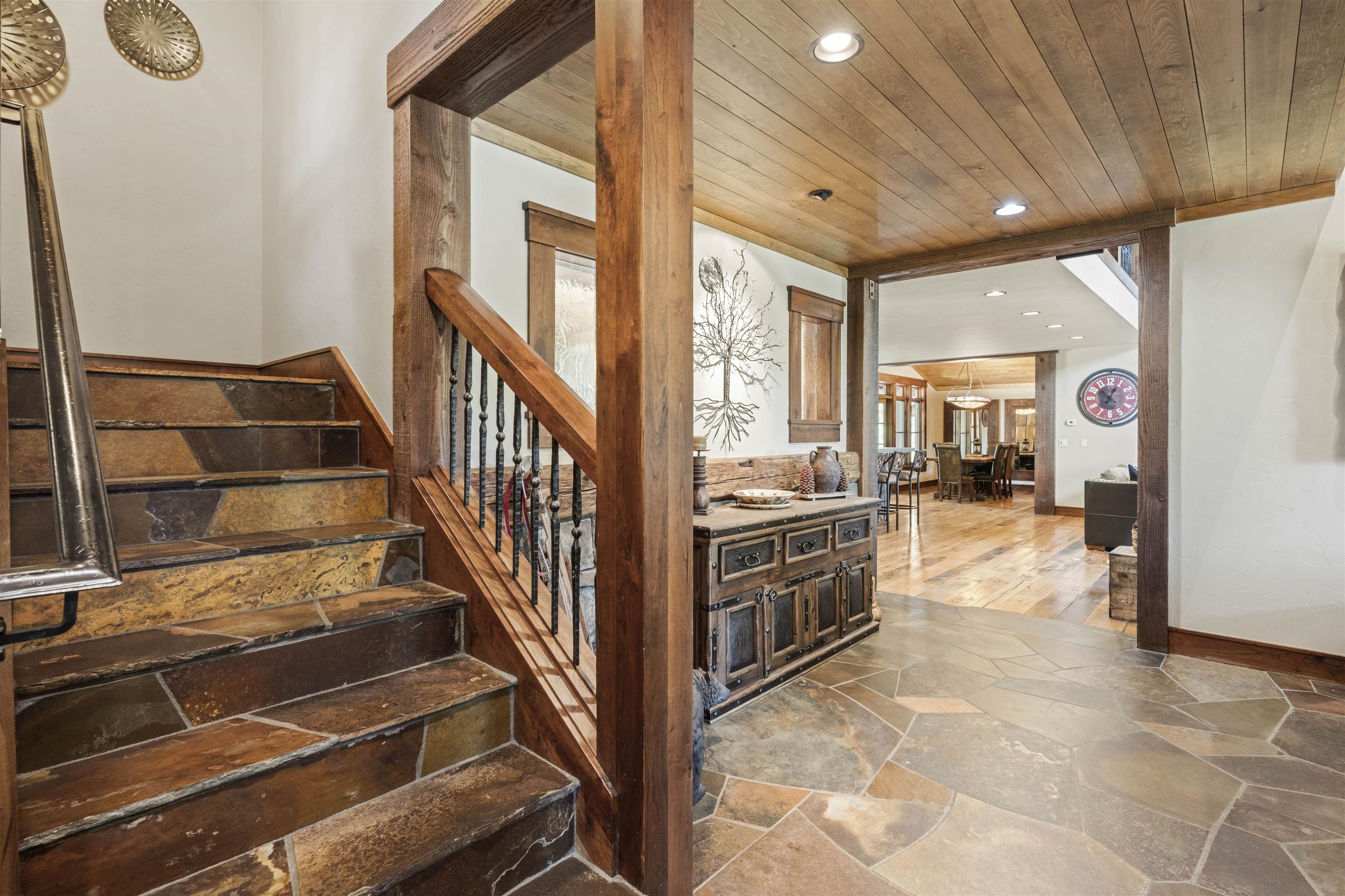 13123 Snowshoe Thompson Circle Truckee, CA 96161 - Photo 11 of 23 a view of a hallway with wooden floor and staircase