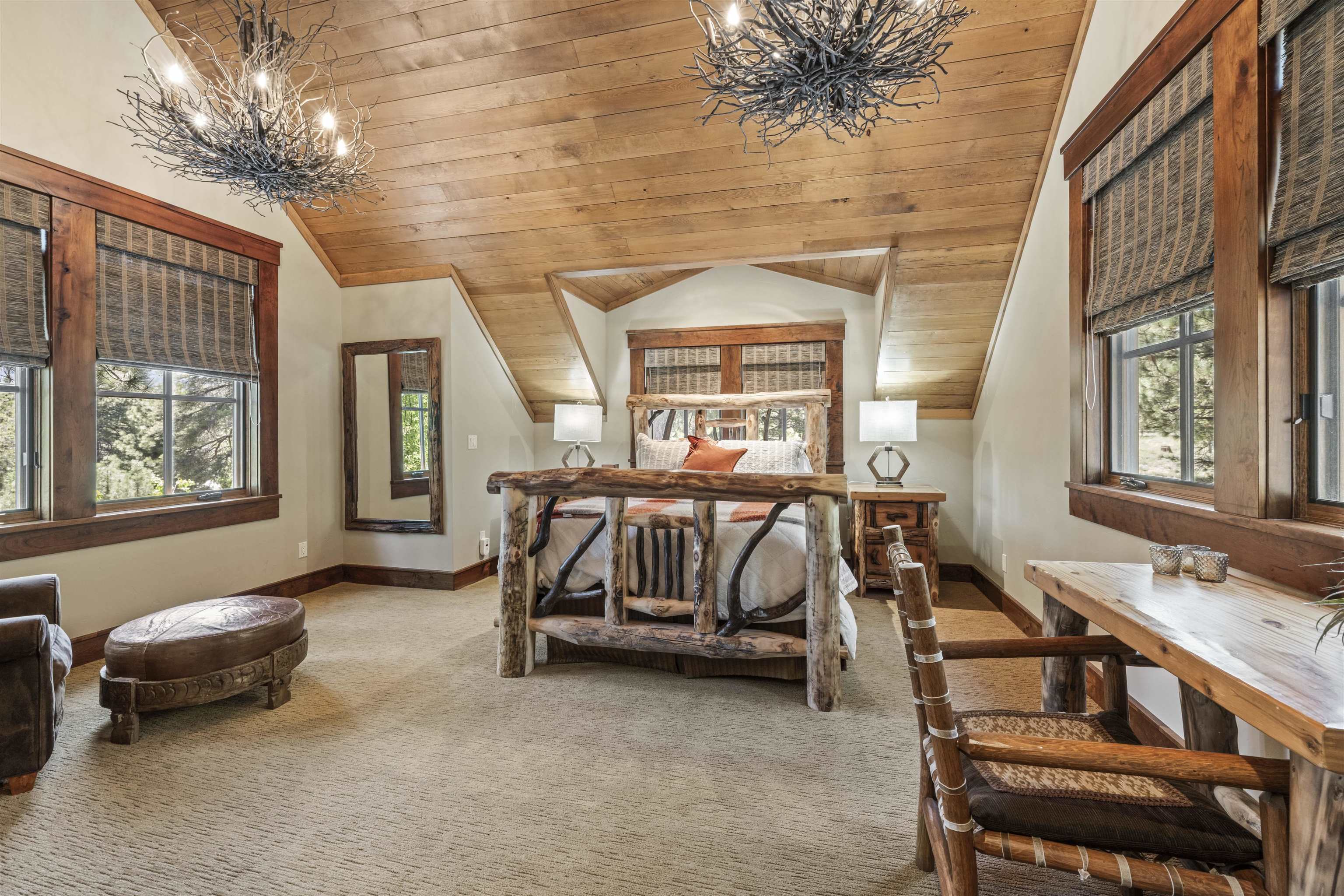 13123 Snowshoe Thompson Circle Truckee, CA 96161 - Photo 12 of 23 a bedroom with furniture and a large window
