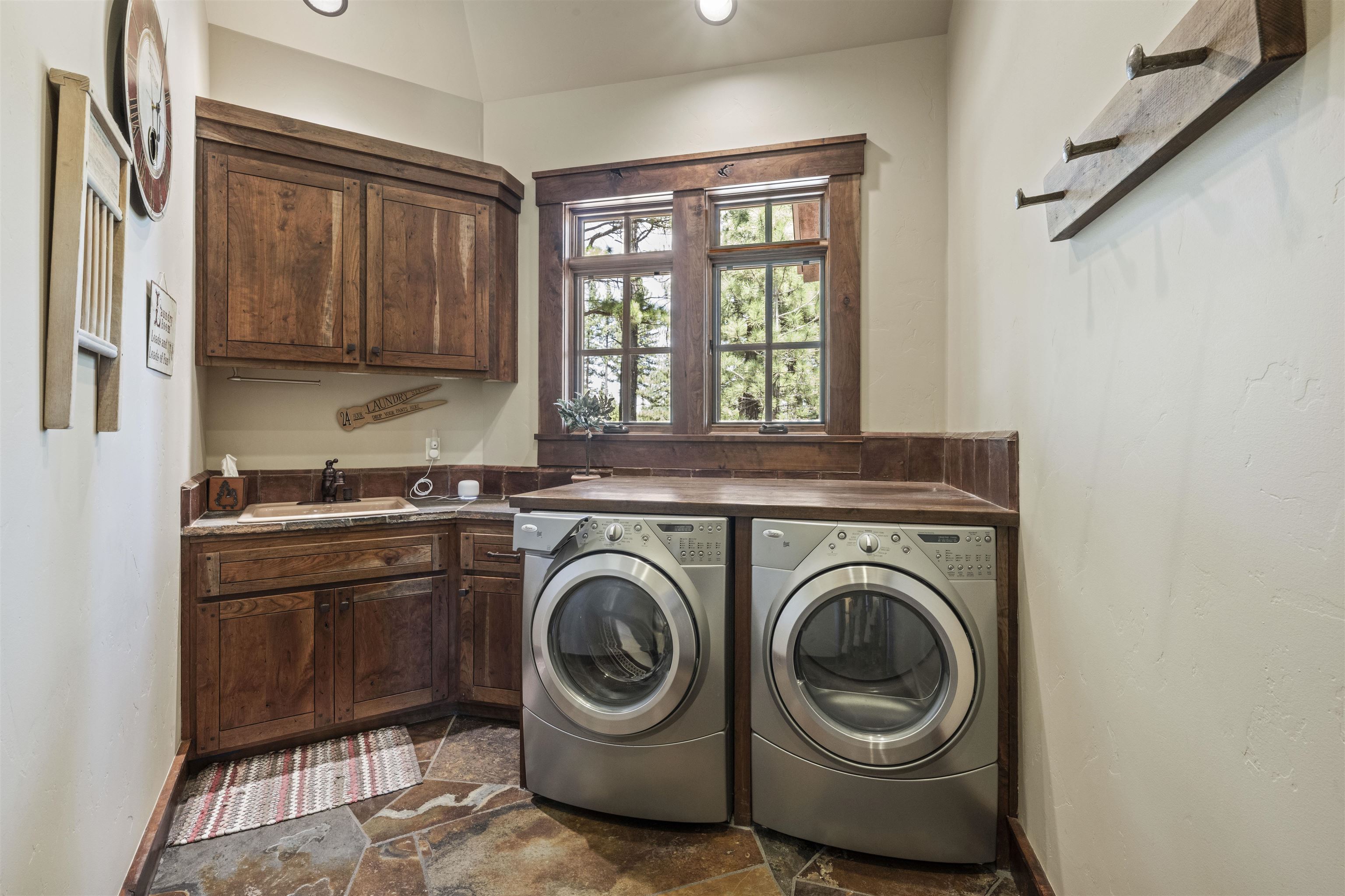 13123 Snowshoe Thompson Circle Truckee, CA 96161 - Photo 18 of 23 a utility room with sink dryer and washer