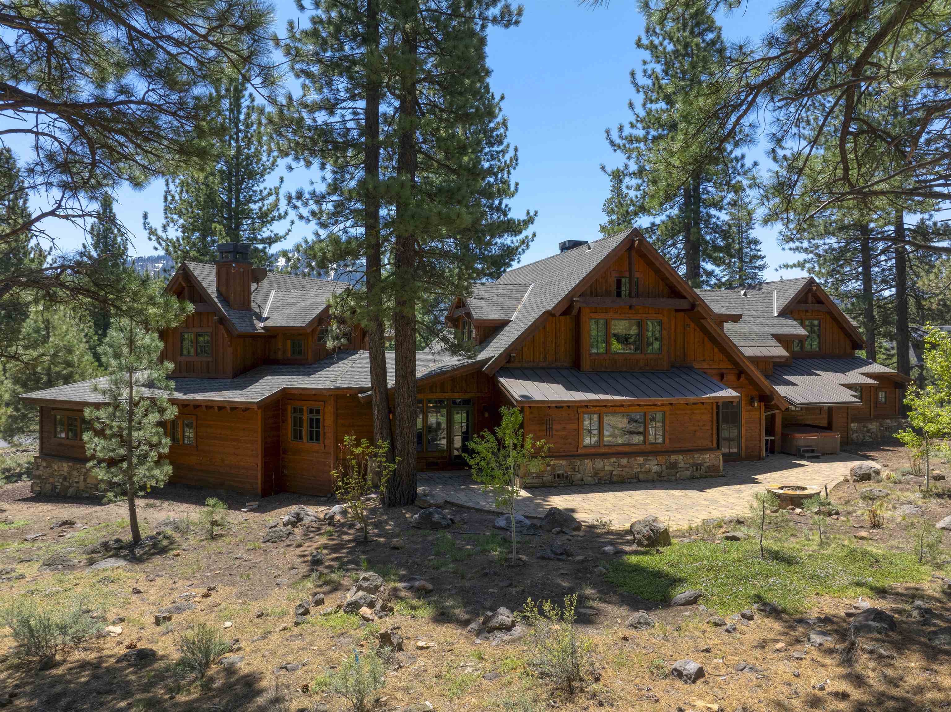 13123 Snowshoe Thompson Circle Truckee, CA 96161 - Photo 20 of 23 a front view of a house with a yard and garage