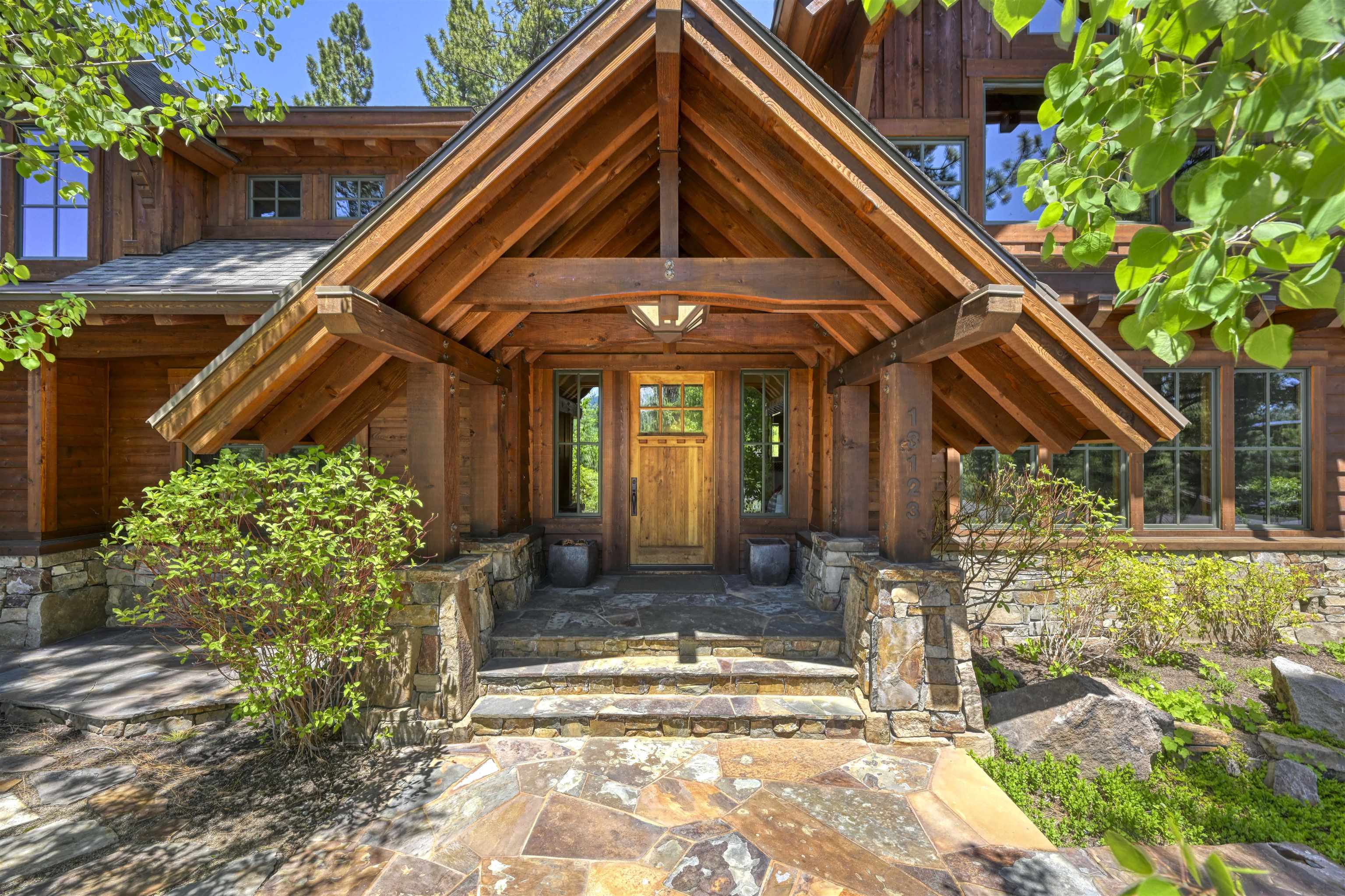13123 Snowshoe Thompson Circle Truckee, CA 96161 - Photo 2 of 23 a front view of a house with a yard