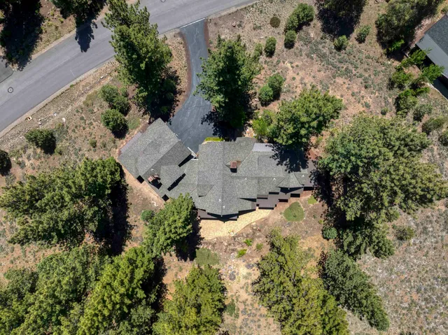 an aerial view of residential house with outdoor space