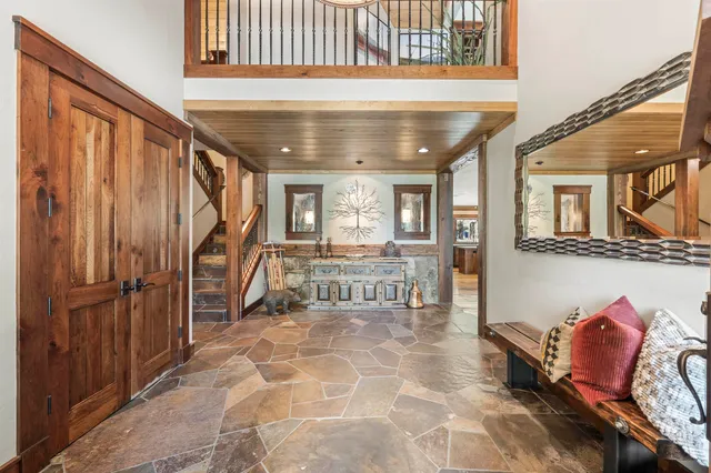 a room with furniture and a large window