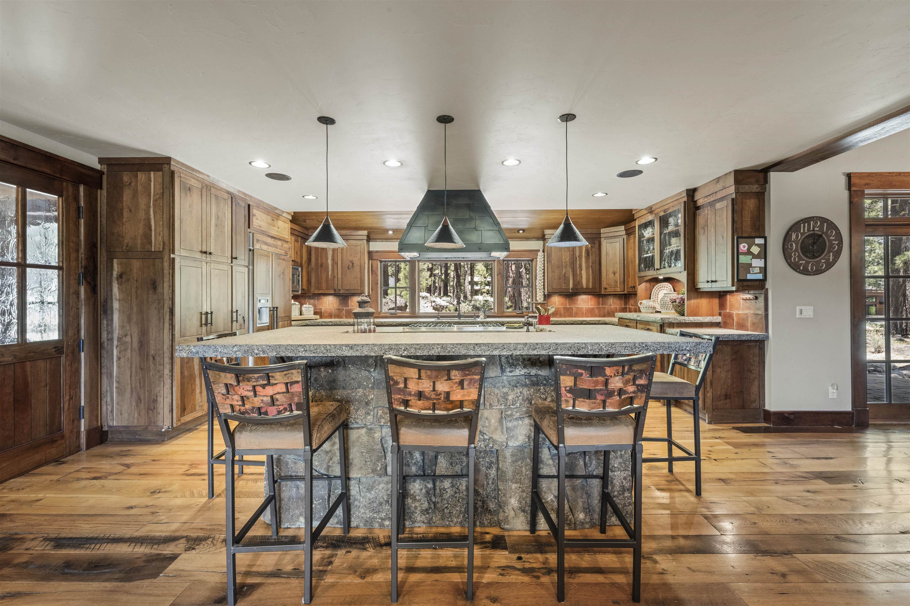 13123 Snowshoe Thompson Circle Truckee, CA 96161 - Photo 6 of 23 a kitchen with a table and chairs in it