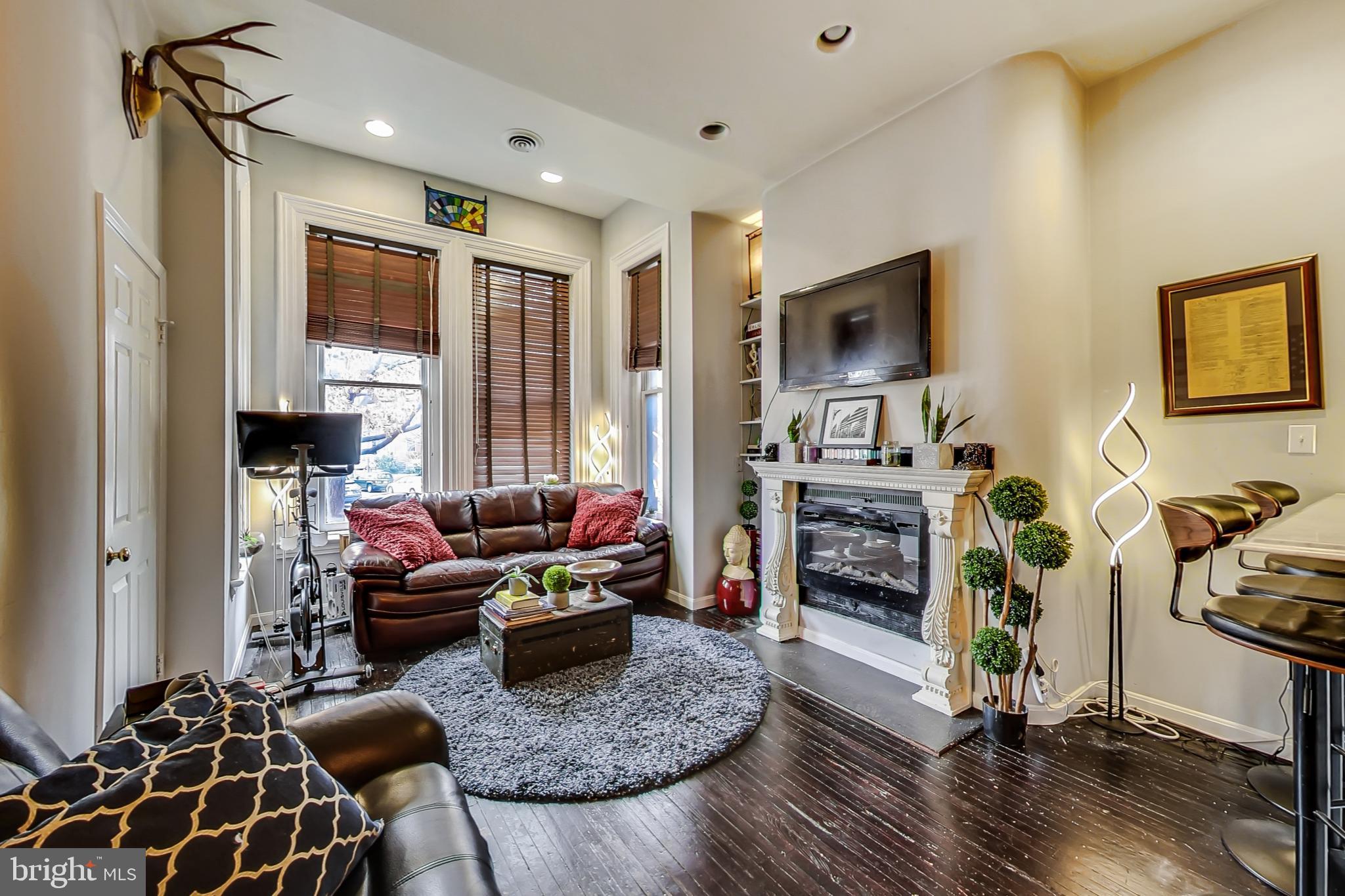 1338 Vermont Avenue Northwest, Unit 3 Washington, DC 20005 - Photo 7 of 25 Cozy Living Room w Fireplace