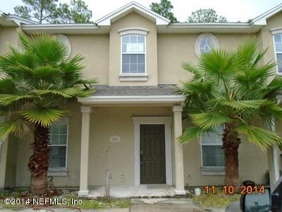4681 Barnes Road South Jacksonville, FL 32207 - Photo 1 of 15 a front view of a house with a yard
