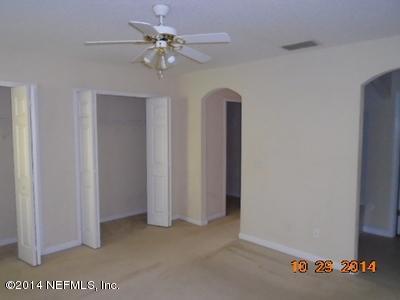 4681 Barnes Road South Jacksonville, FL 32207 - Photo 3 of 15 wooden floor in an empty room