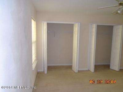 4681 Barnes Road South Jacksonville, FL 32207 - Photo 4 of 15 a view of an empty room with windows