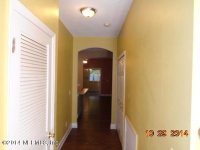 4681 Barnes Road South Jacksonville, FL 32207 - Photo 8 of 15 a view of a hallway with wooden floor