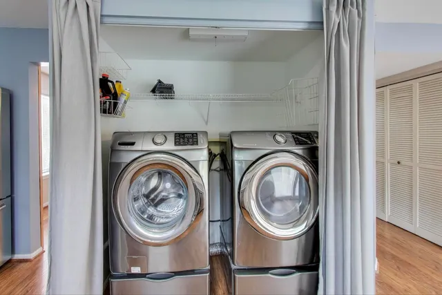a utility room with dryer and washer