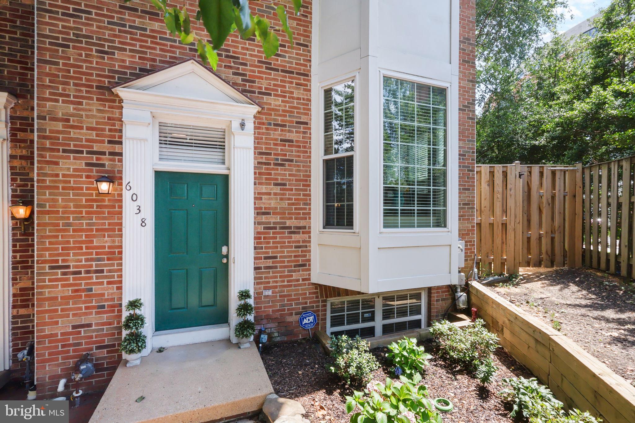 6038 Lincolnia Road Alexandria, VA 22312 - Photo 1 of 31 a front view of a house with a yard