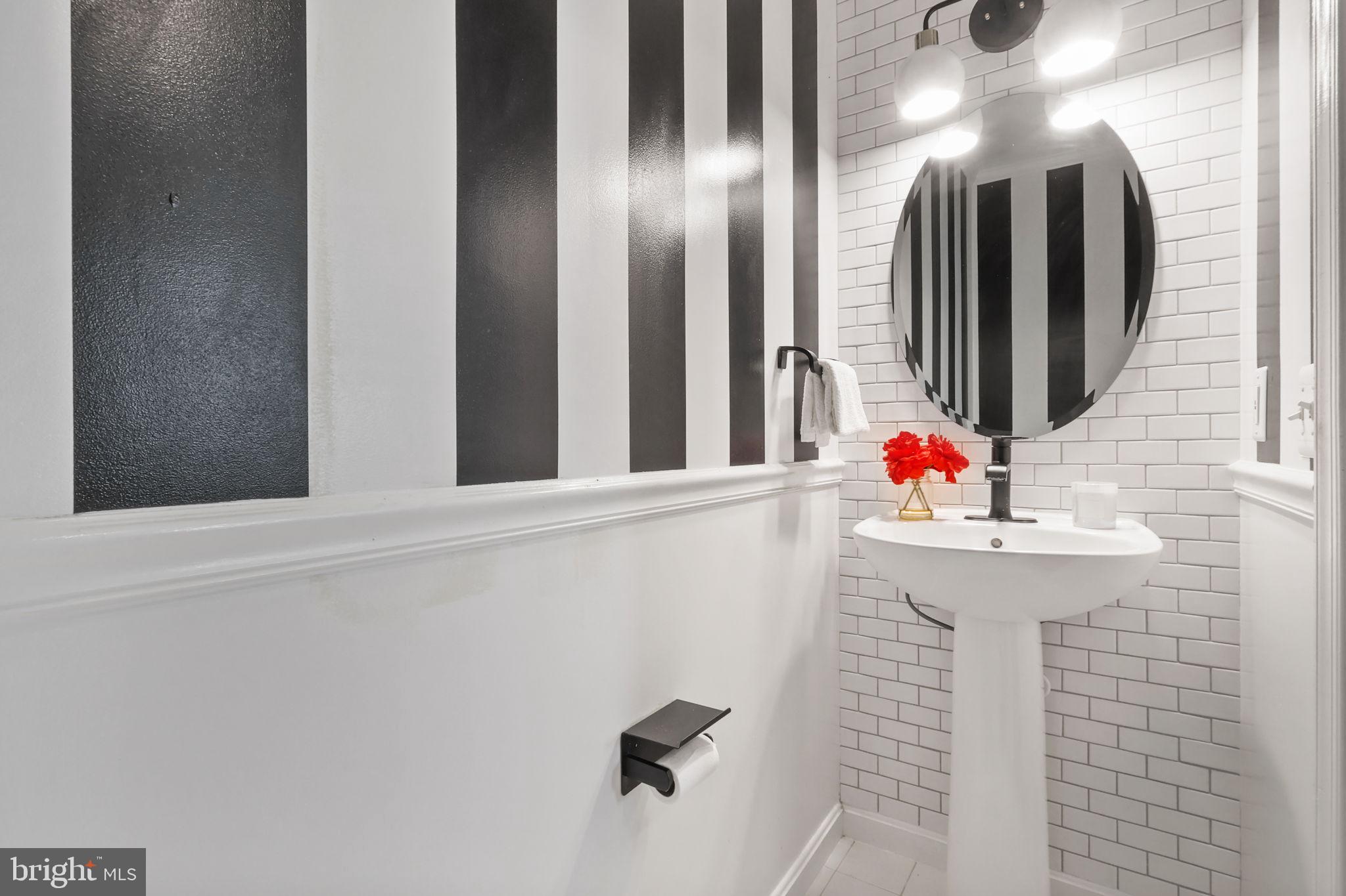 6038 Lincolnia Road Alexandria, VA 22312 - Photo 12 of 31 a bathroom with a sink and a mirror
