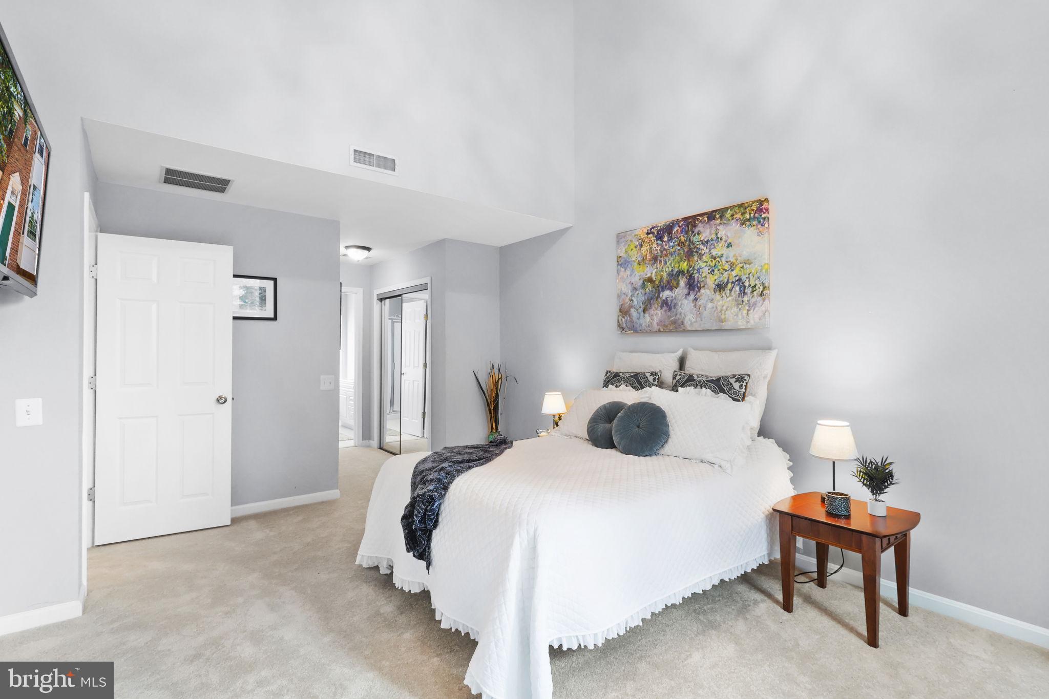 6038 Lincolnia Road Alexandria, VA 22312 - Photo 14 of 31 a bedroom with a bed and a table