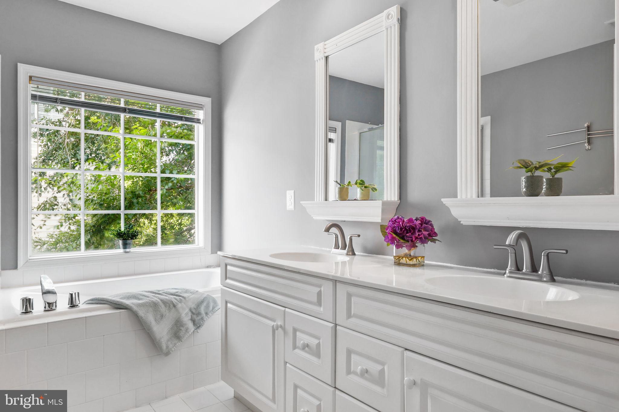 6038 Lincolnia Road Alexandria, VA 22312 - Photo 16 of 31 a bathroom with a sink and a window