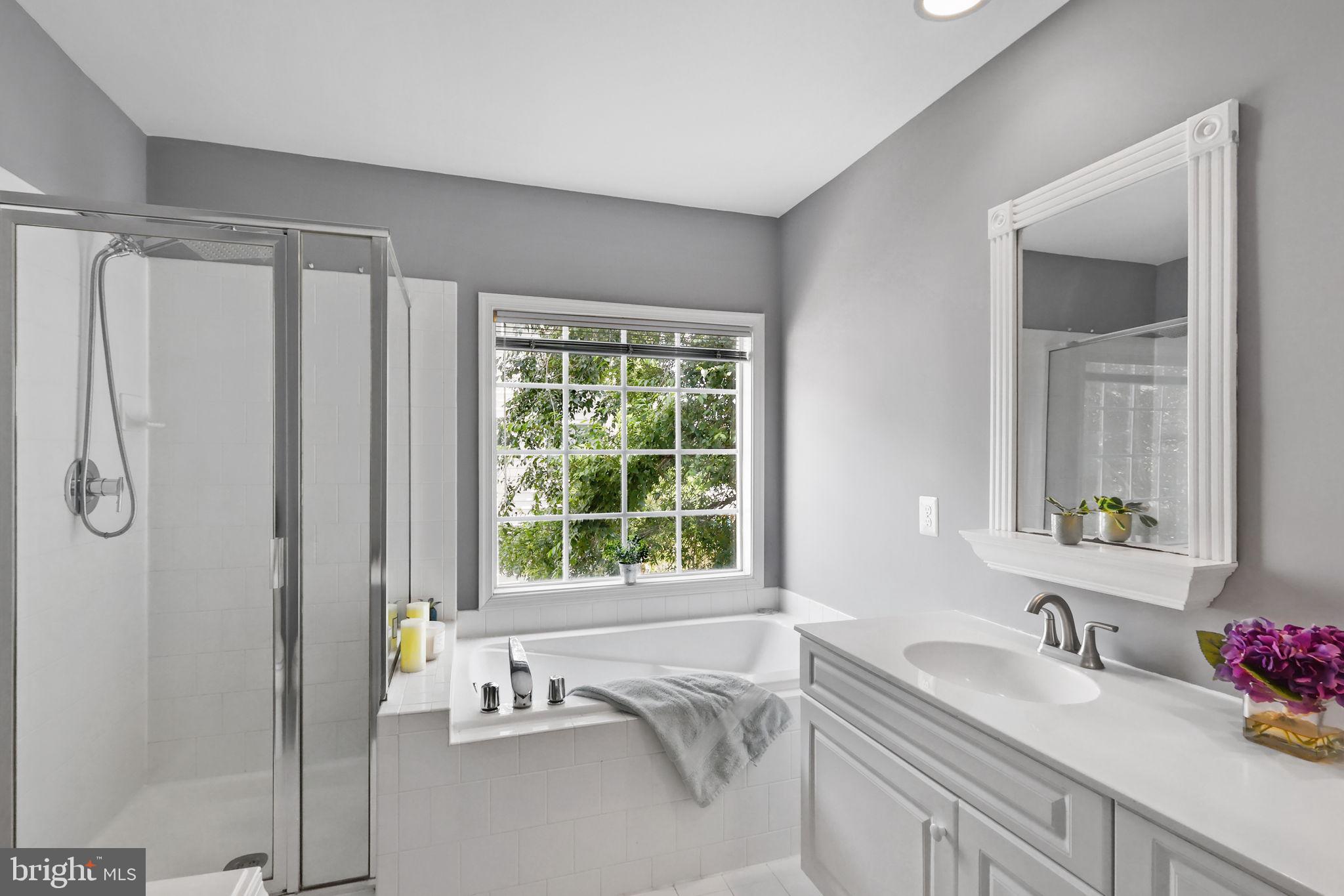 6038 Lincolnia Road Alexandria, VA 22312 - Photo 17 of 31 a bathroom with a granite countertop sink and a window
