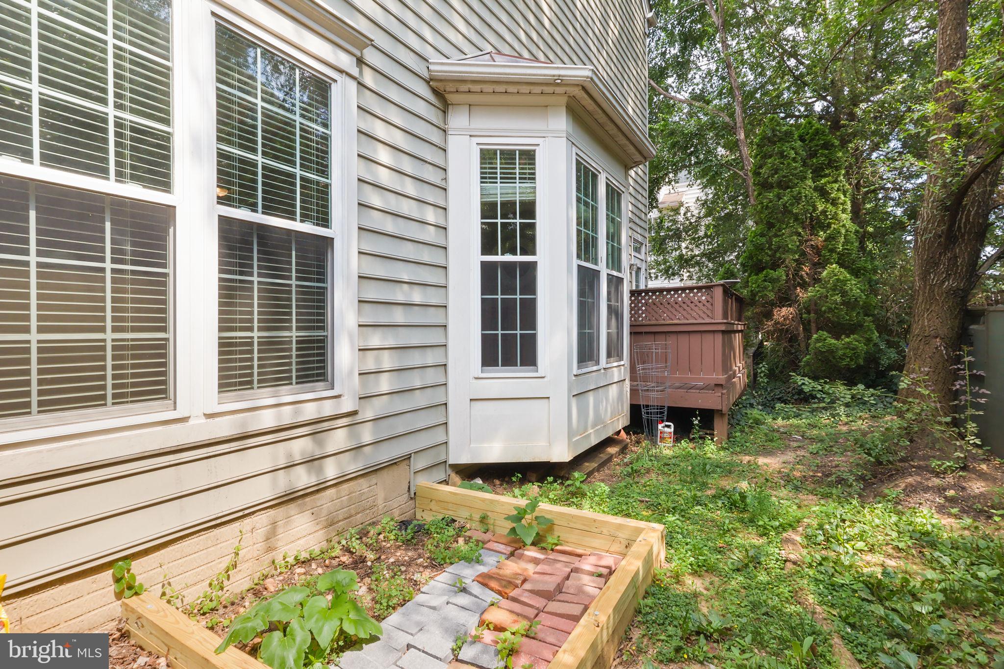 6038 Lincolnia Road Alexandria, VA 22312 - Photo 26 of 31 a house view with a garden space