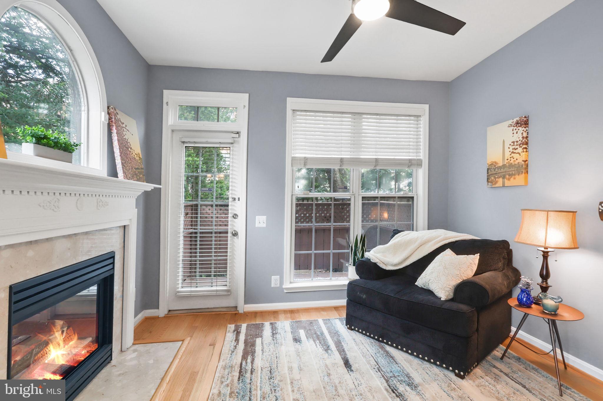 6038 Lincolnia Road Alexandria, VA 22312 - Photo 6 of 31 a living room with furniture and a fireplace