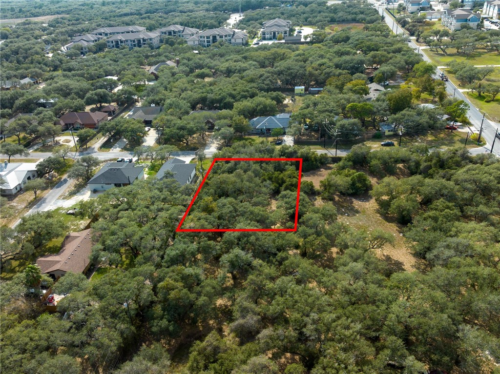 Lot 4 Indian Ingleside, TX 78362 - Photo 7 of 14 an aerial view of residential houses with outdoor space and trees