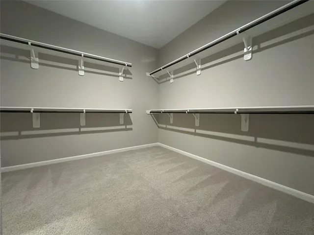 a view of an empty walk in closet