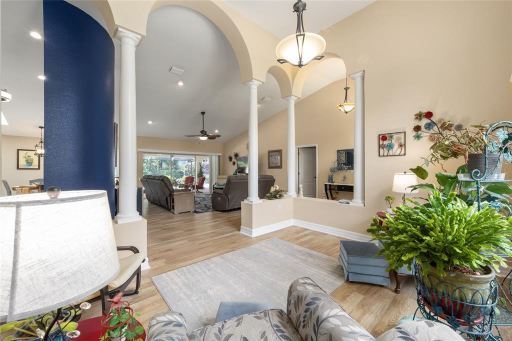 18825 Southwest 93rd Loop Dunnellon, FL 34432 - Photo 21 of 85 a living room with furniture flowerpot and a chandelier