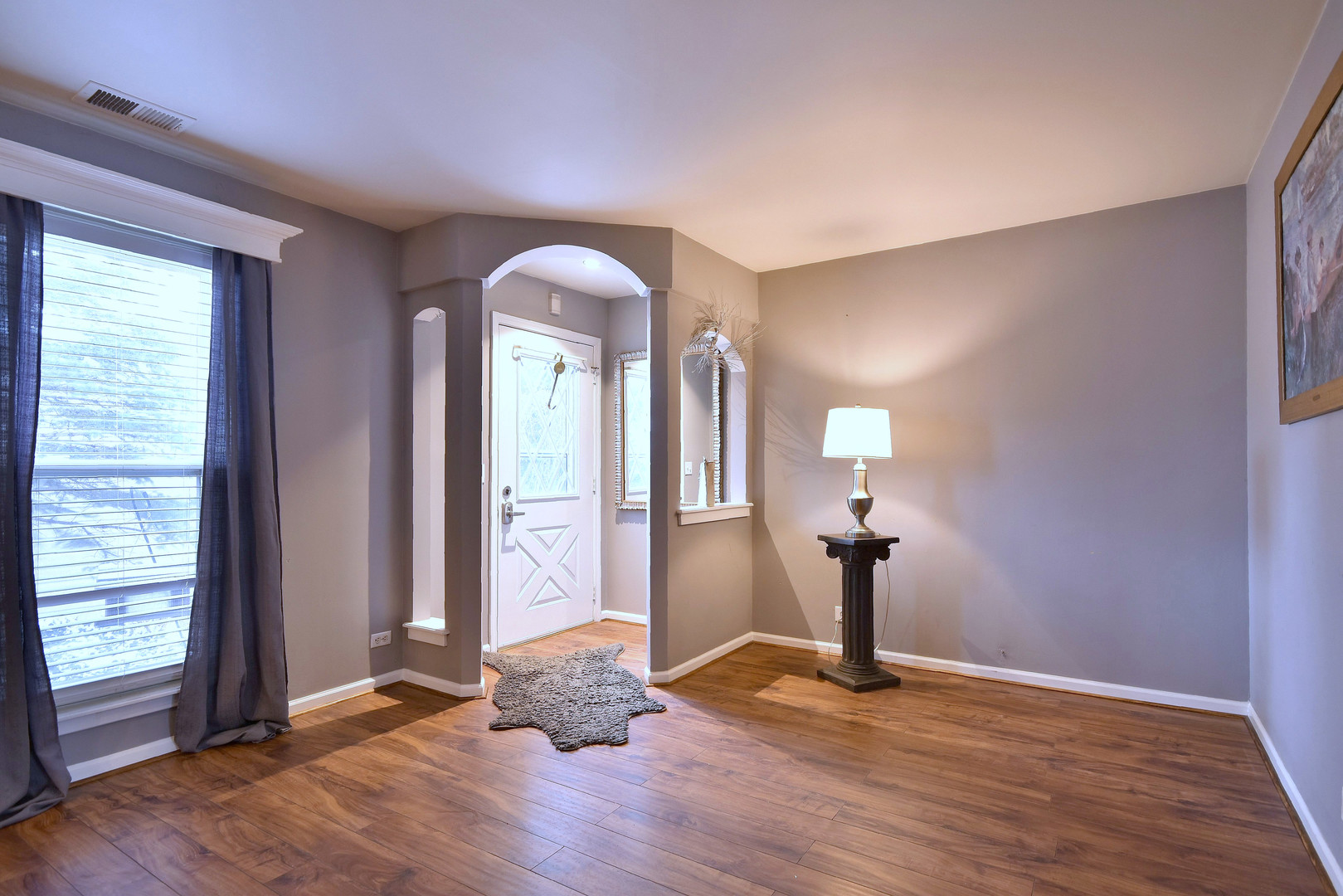 260 Rodenburg Road Roselle, IL 60172 - Photo 30 of 39 a view of a room with wooden floor