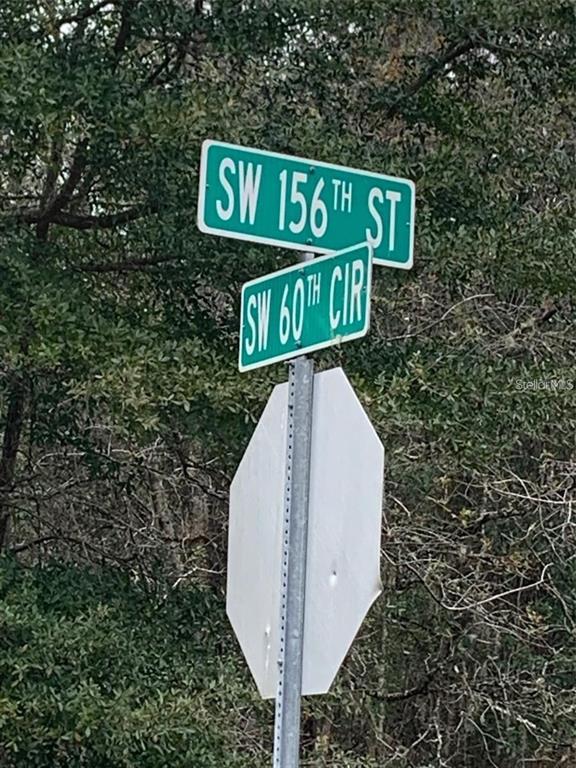 156 St Ocala Ocala, FL 34473 - Photo 6 of 6 a street sign that is on a pole