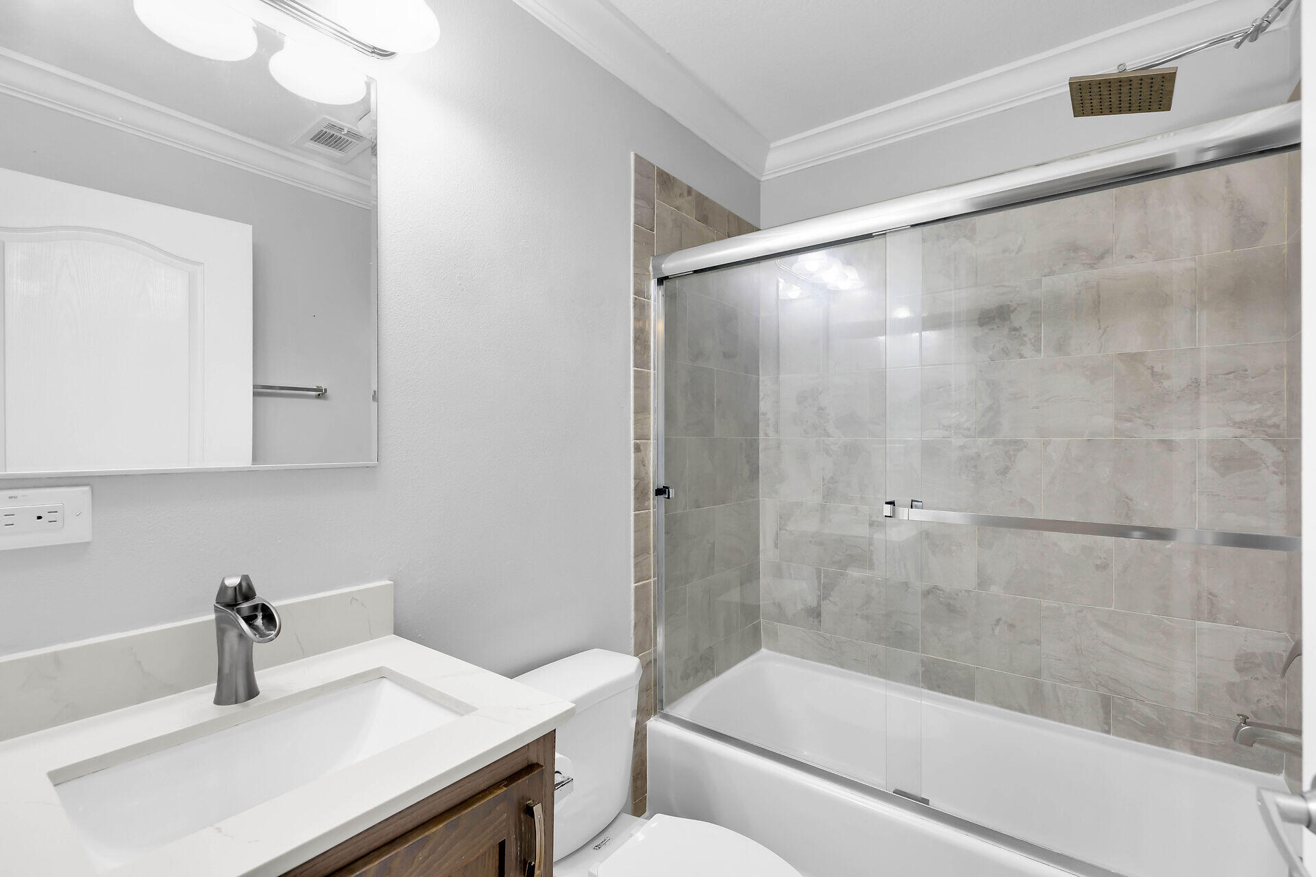 59 Ed Swift Road Key West, FL 33040 - Photo 24 of 35 a bathroom with a sink and a mirror