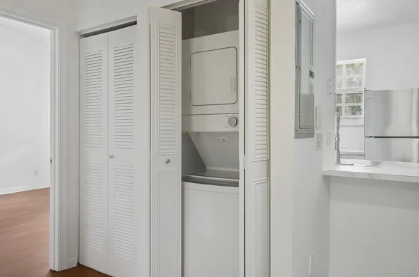a bathroom with a shower and a sink