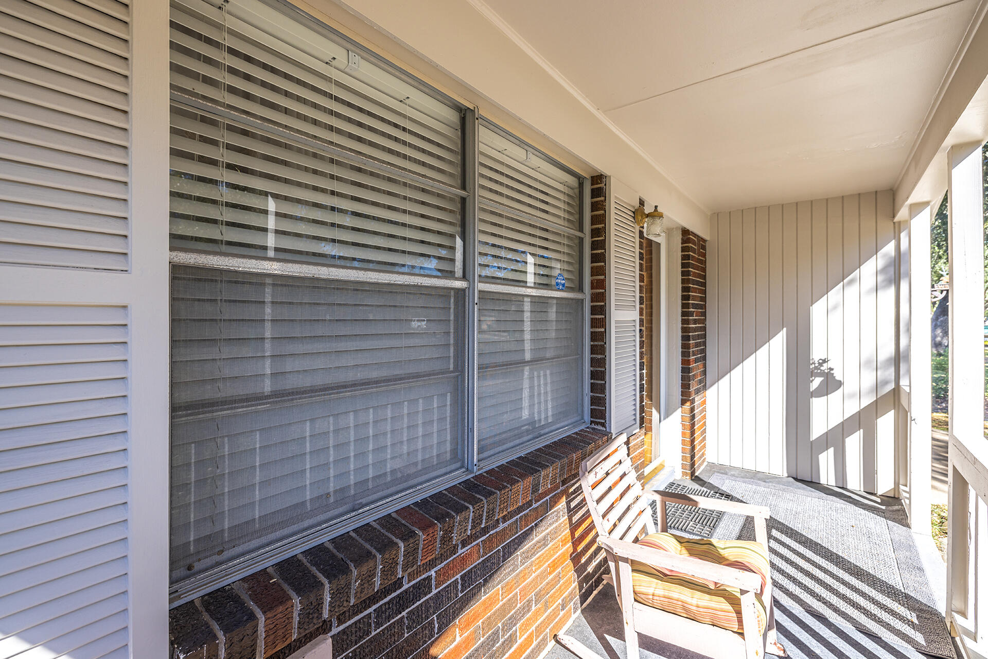 1709 Valparaiso Boulevard Niceville, FL 32578 - Photo 14 of 33 a view of a balcony with a floor to ceiling window