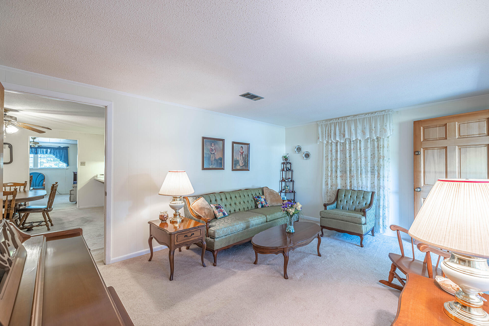 1709 Valparaiso Boulevard Niceville, FL 32578 - Photo 18 of 33 a living room with furniture and a couch