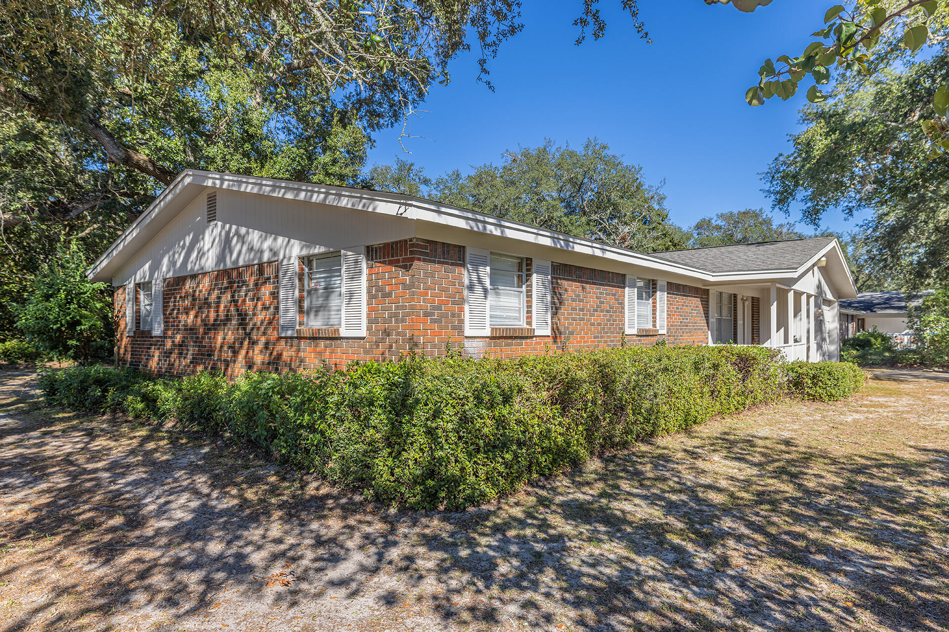 1709 Valparaiso Boulevard Niceville, FL 32578 - Photo 2 of 33 a aerial view of a house with a yard