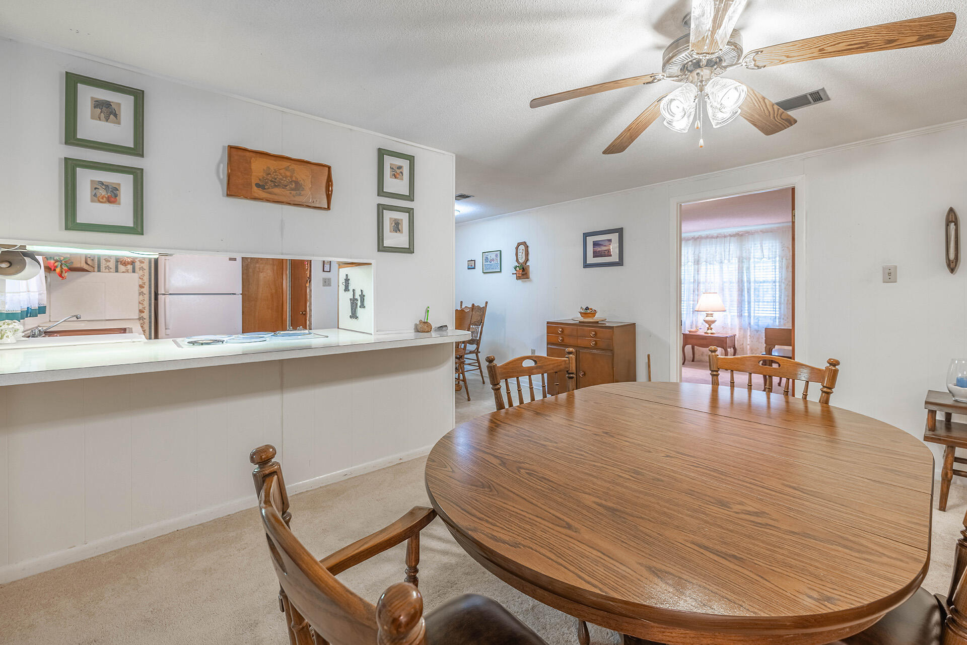 1709 Valparaiso Boulevard Niceville, FL 32578 - Photo 21 of 33 a dining room with furniture and window