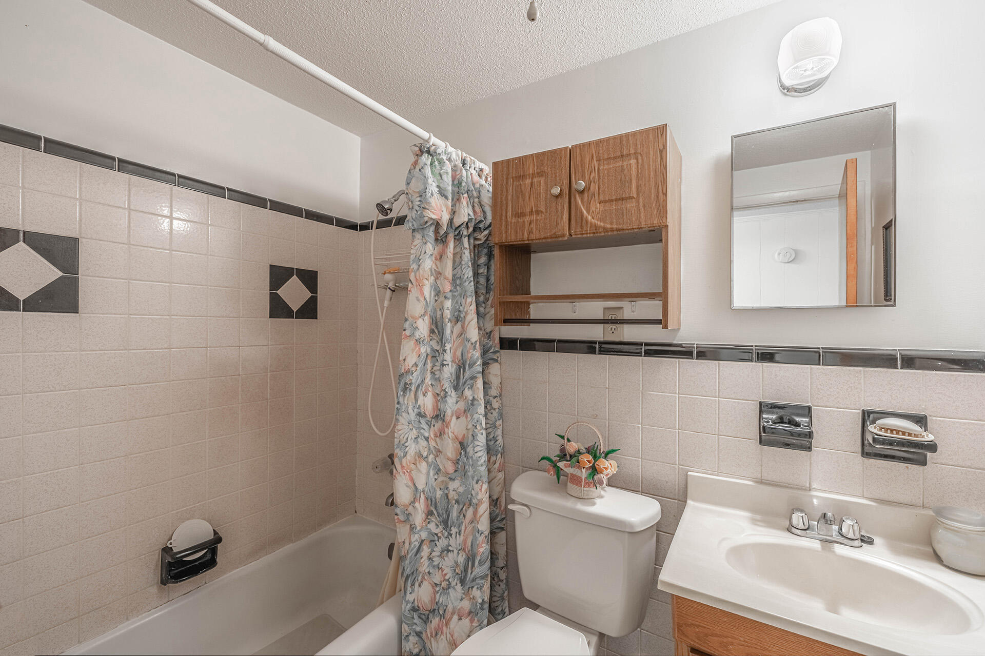 1709 Valparaiso Boulevard Niceville, FL 32578 - Photo 28 of 33 a bathroom with a sink a toilet and shower