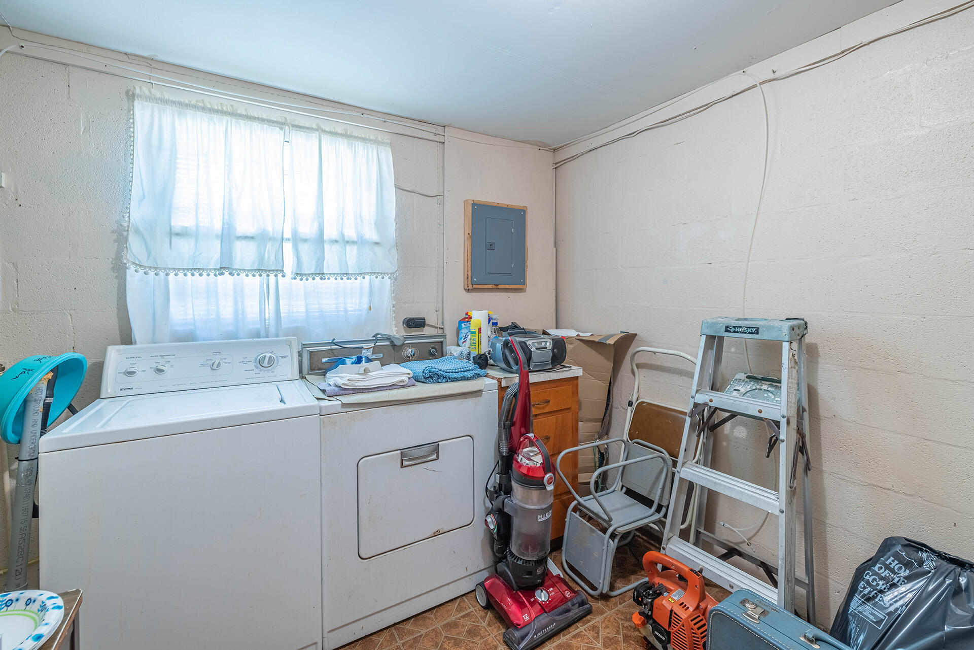 1709 Valparaiso Boulevard Niceville, FL 32578 - Photo 33 of 33 a view of storage and utility room with washer and dryer