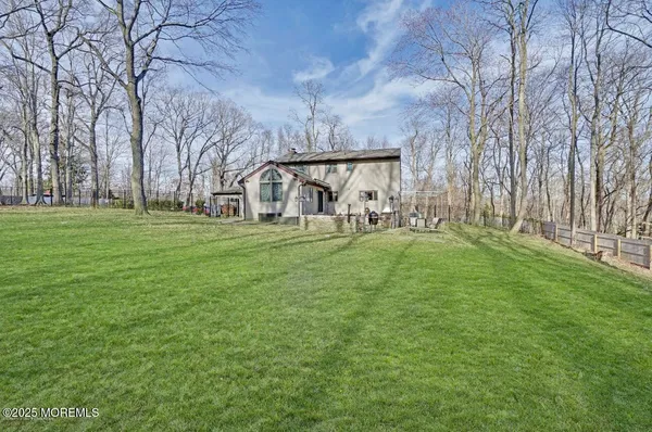 a view of a park with large trees