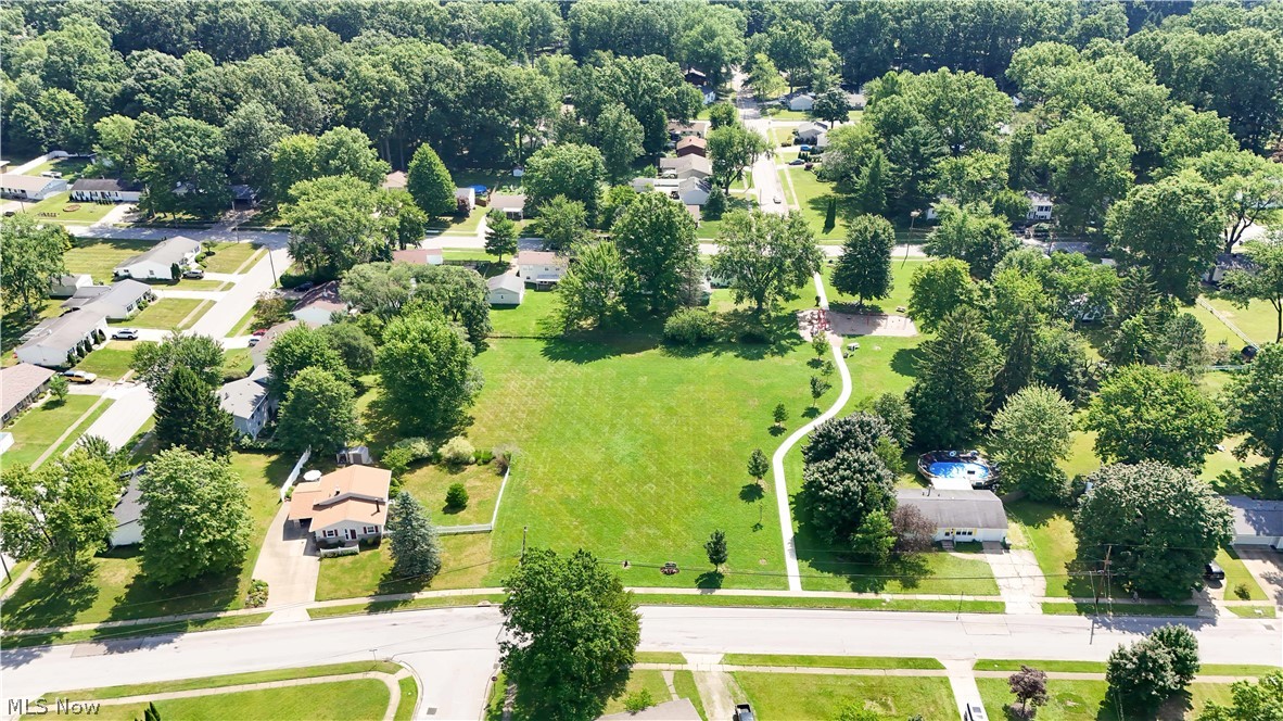 3796 North Santom Road Stow, OH 44224 - Photo 27 of 30 Expansive green space and surrounding neighborhood with mature trees
