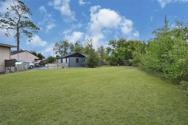 a house view with garden space