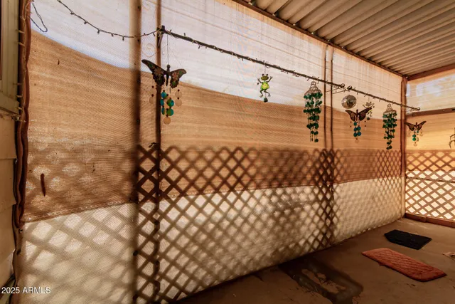 a view of sign board with flower around