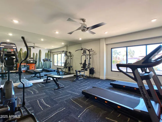 a view of swimming pool with outdoor seating and yard