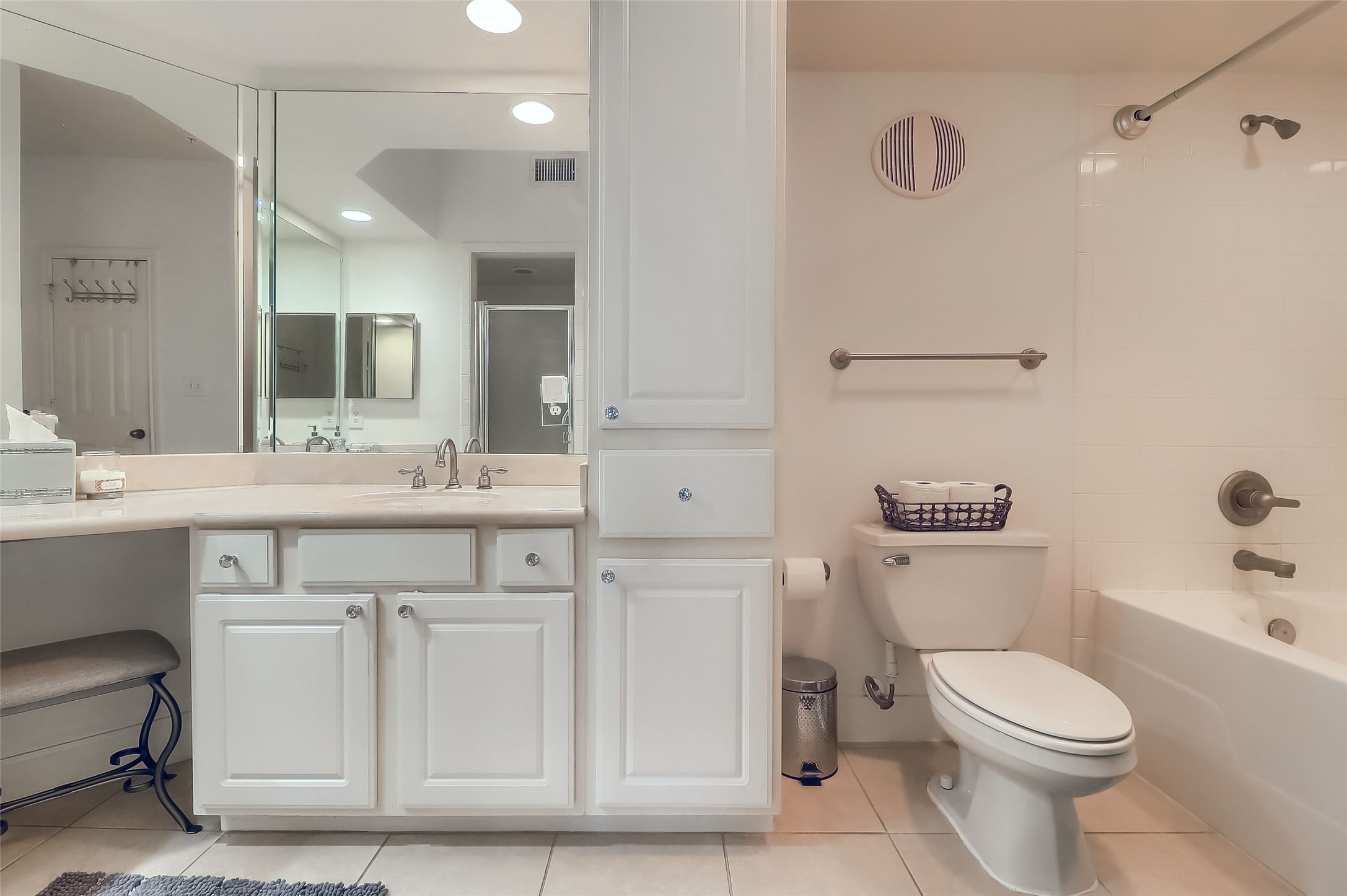 7701 Rialto Boulevard, Unit 1128 Austin, TX 78735 - Photo 15 of 35 a bathroom with a sink a toilet and shower