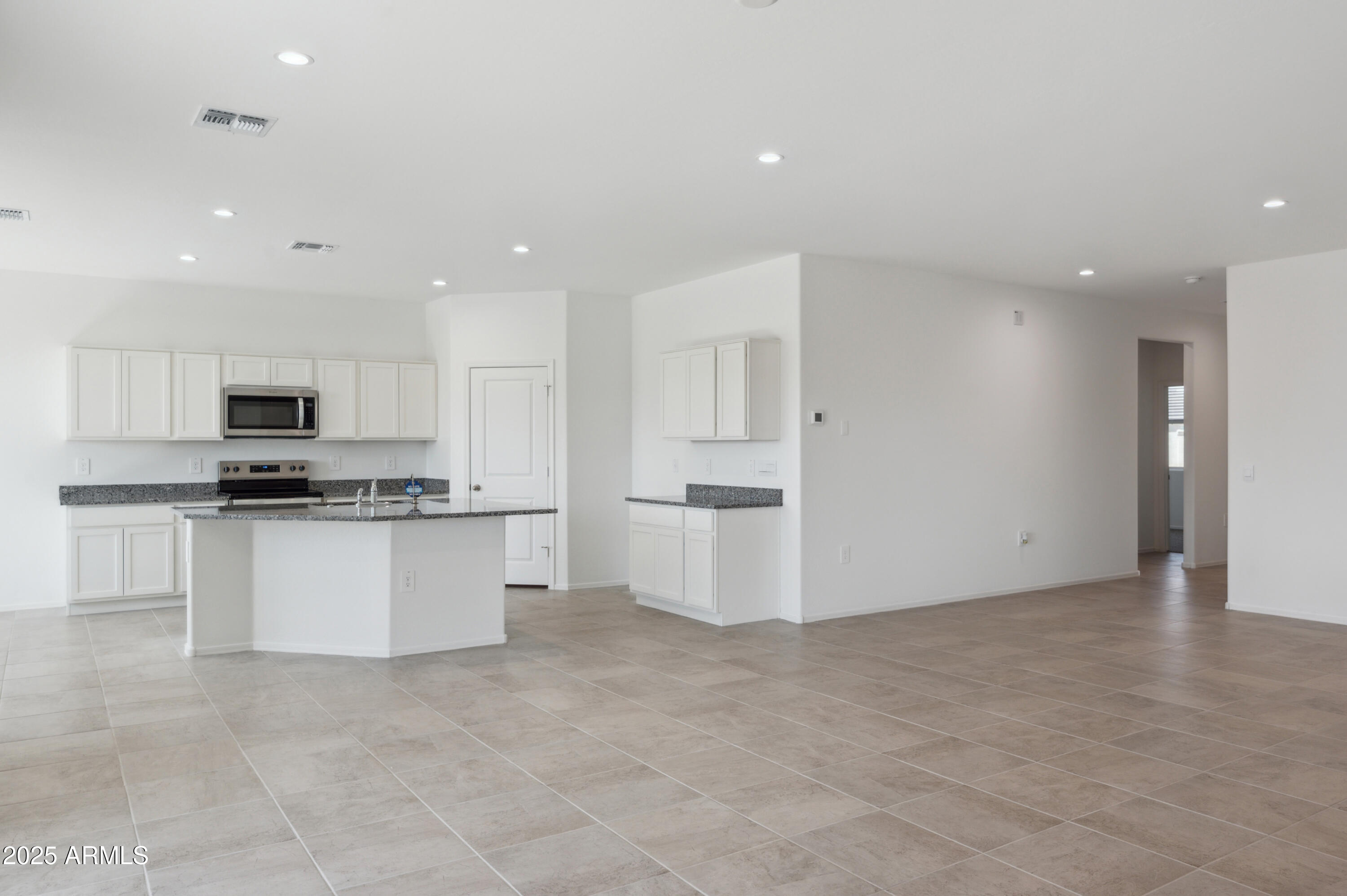 175 South Almoner Lane Casa Grande, AZ 85122 - Photo 31 of 54 a view of kitchen with stainless steel appliances cabinets