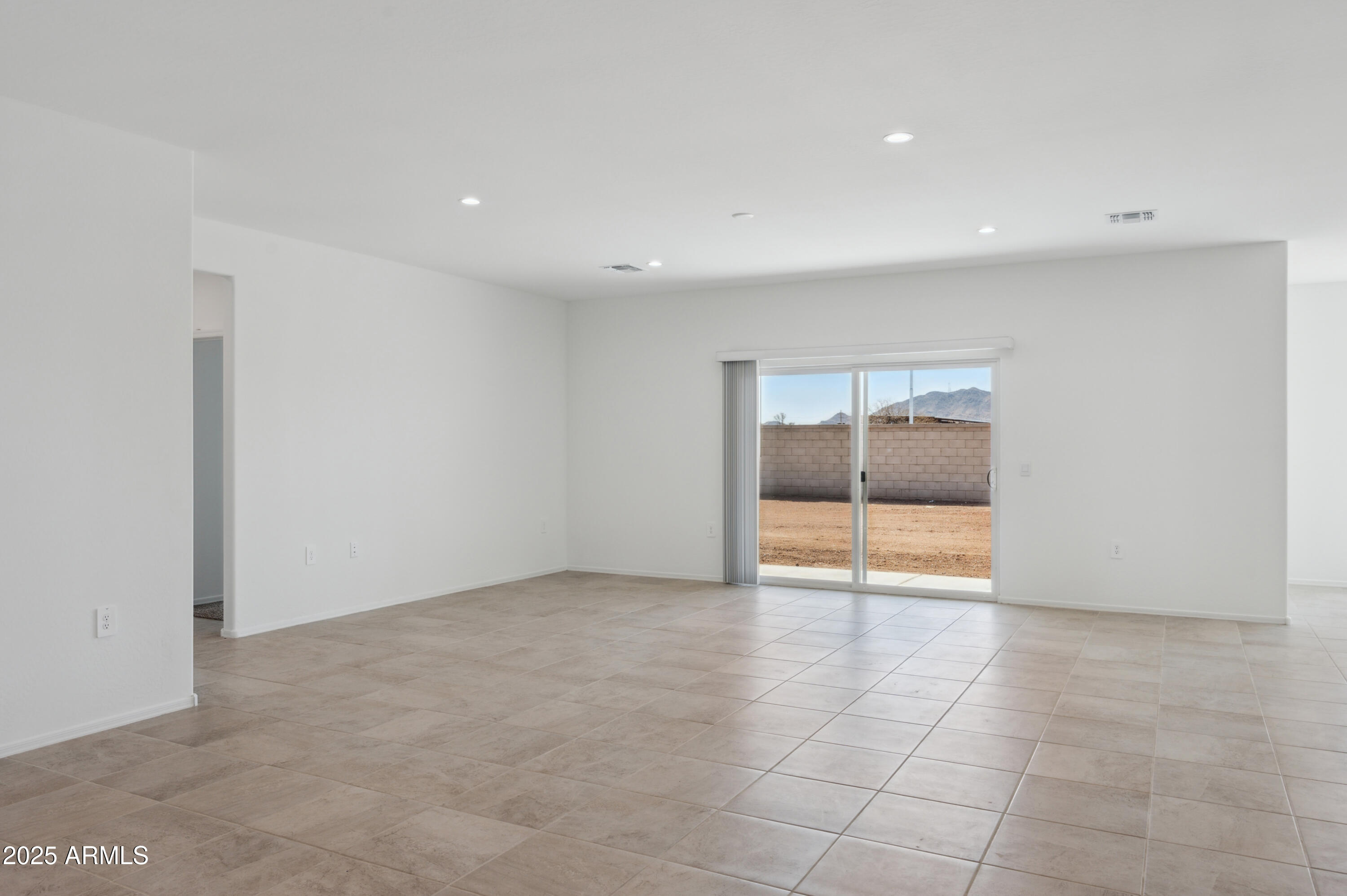 175 South Almoner Lane Casa Grande, AZ 85122 - Photo 36 of 54 a view of an empty room with a window